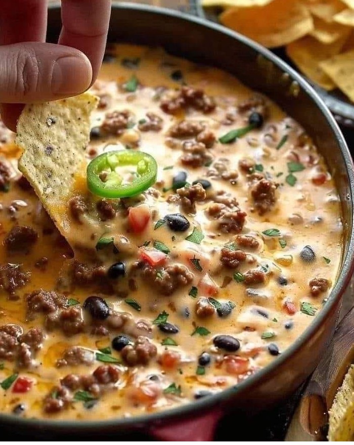 Recipe for Loaded Beef and Bean Nacho Cheese Dip