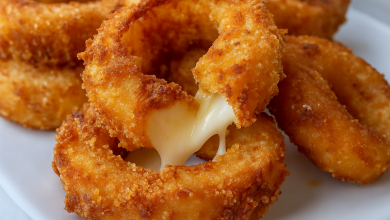 Cheesy Mozzarella Onion Rings with crispy coating and melted cheese center