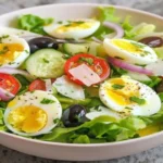Refreshing Salad with Hard-Boiled Eggs, Lettuce, Cucumber, and Cherry Tomatoes