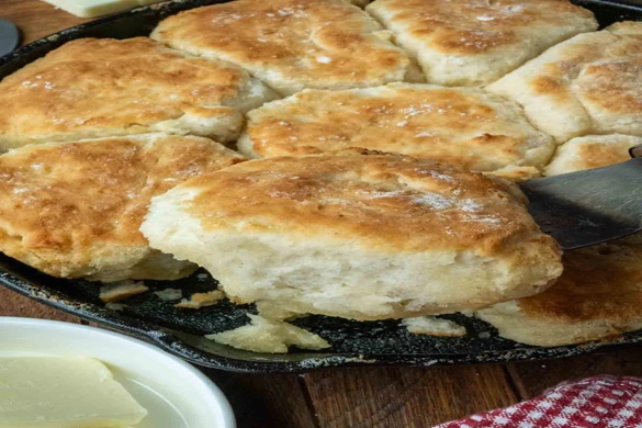 Fluffy golden 7-Up Biscuits in a cast iron skillet