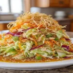 Asian Cabbage Slaw with Sesame Dressing – crunchy cabbage salad with almonds and sesame seeds