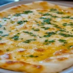 Cheesy Garlic Butter Flatbread Recipe baked golden with parsley and garlic butter.