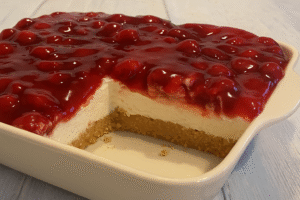 Classic Cherry Delight Recipe dessert with graham cracker crust and cherry topping