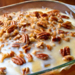 Pecan Praline Cake with a rich praline topping and chopped pecans — the perfect sweet and nutty dessert for any occasion.