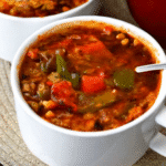 Stuffed Pepper Soup in a bowl with vibrant peppers, rice, and savory broth — perfect for cozy meals.