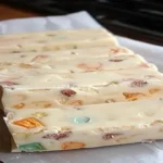 Creamy White Chocolate Fudge with colorful candied fruits – an easy no-bake holiday dessert that’s perfect for gifting or sharing.
