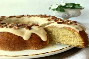 Easy Banana Vanilla Bean Caramel Cake topped with caramel glaze